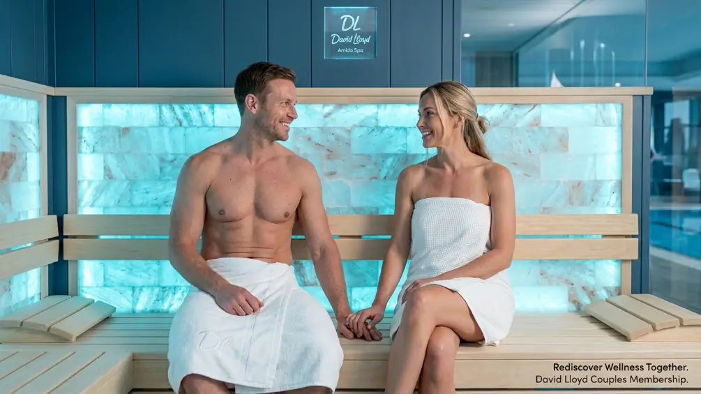 David Lloyd Couples Membership — couple enjoying indoor swimming pool and spa facilities included in joint membership 2026